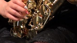 Kyoka Makimura plays the saxophone and shows off her hot